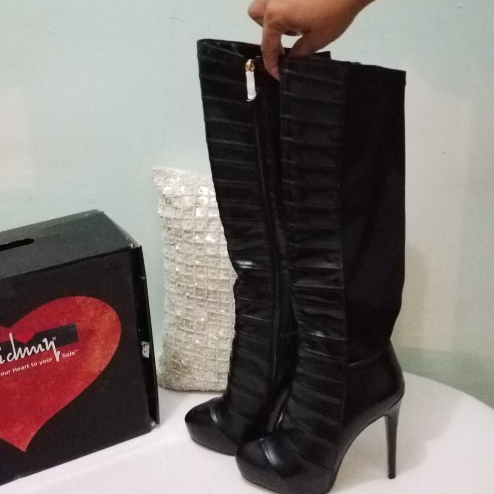 Black knee length stiletto boots